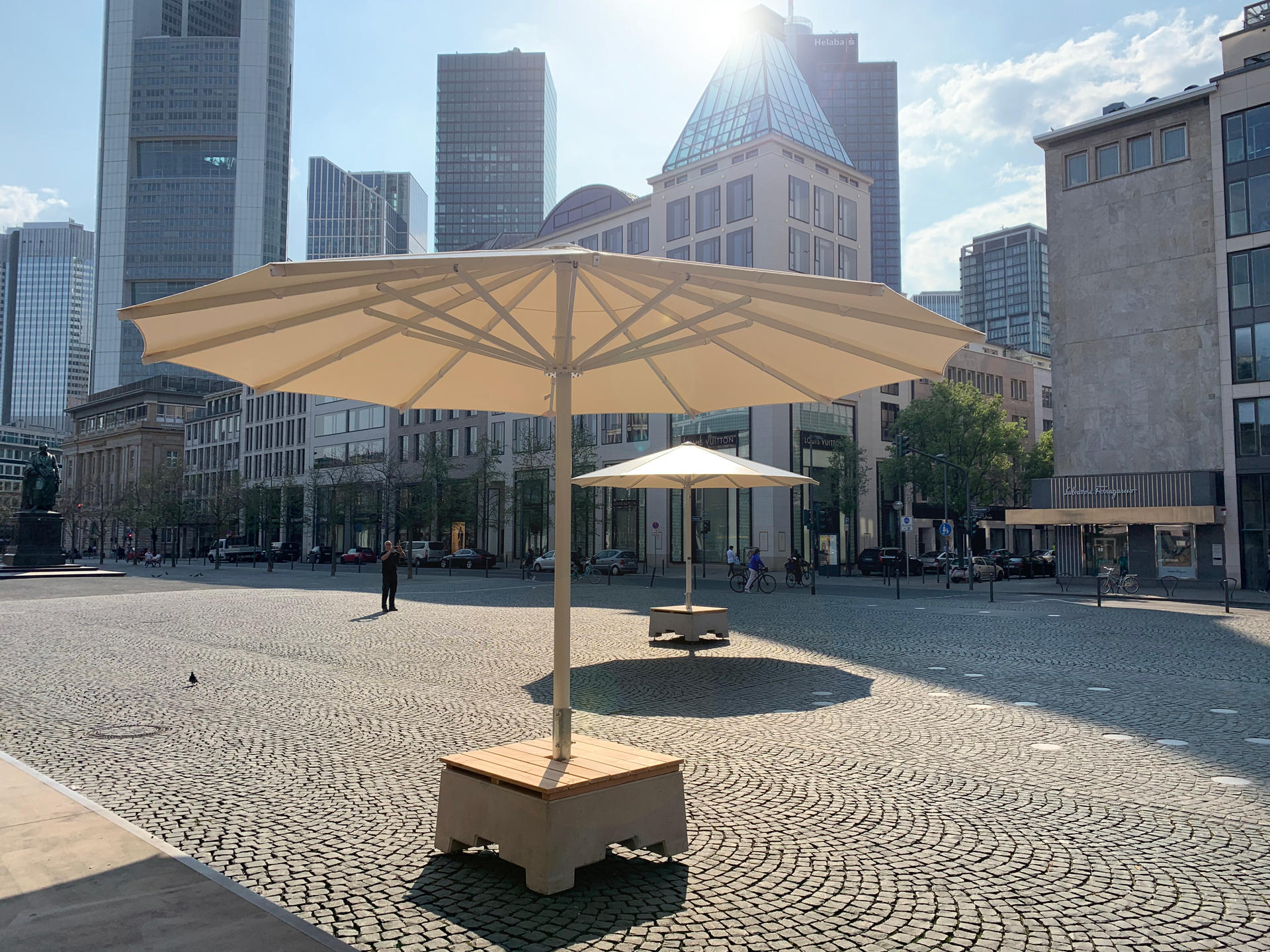 Public area with white parasols